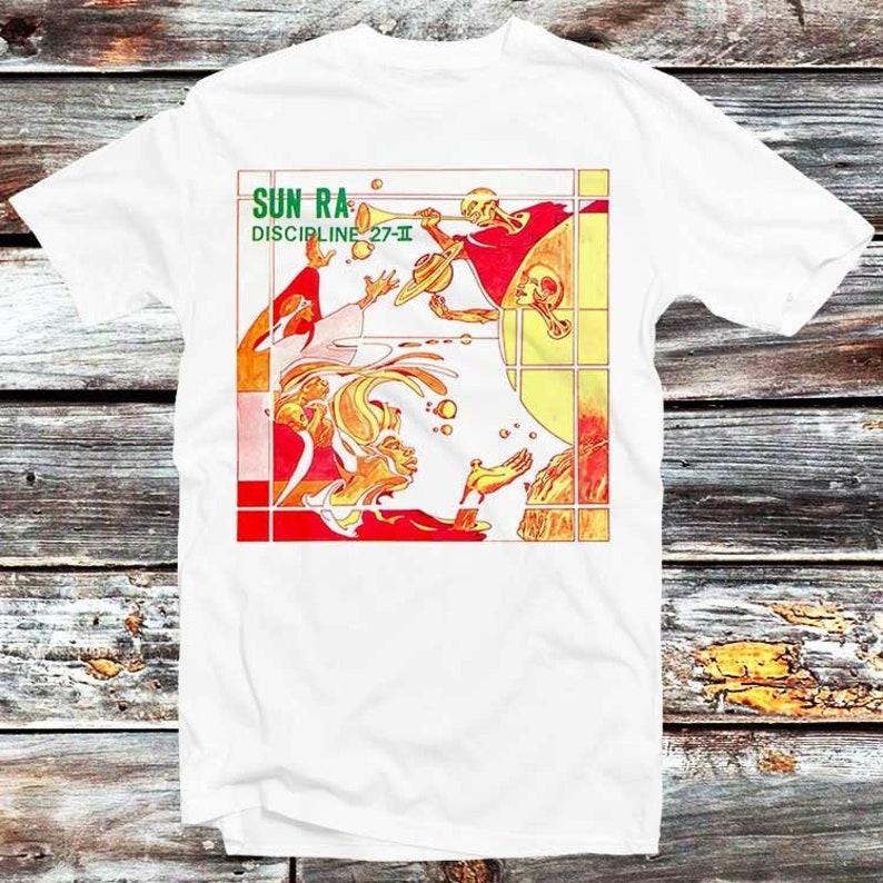 230 Gsm 100% Cotton Sun Ra Discipline 27 Ii T Shirt Vintage Retro Cool Gift Mens Womens Unisex Cartoon Anime Top Tee B325 3XL білий
230 Gsm 100% Cotton Sun Ra Discipline 27 Ii T Shirt Vintage Retro Cool Gift Mens Womens Unisex Cartoon Anime Top Tee B325 3XL білий