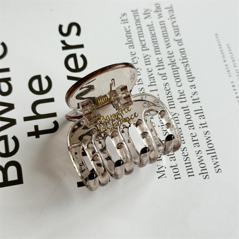 Gold Label Letter Simple Clasp Versatile Resin Dogtail Hair Clip for The Back of The Head of Women Like Sharks small прозорий/сірий колір
Gold Label Letter Simple Clasp Versatile Resin Dogtail Hair Clip for The Back of The Head of Women Like Sharks small прозорий/сірий колір