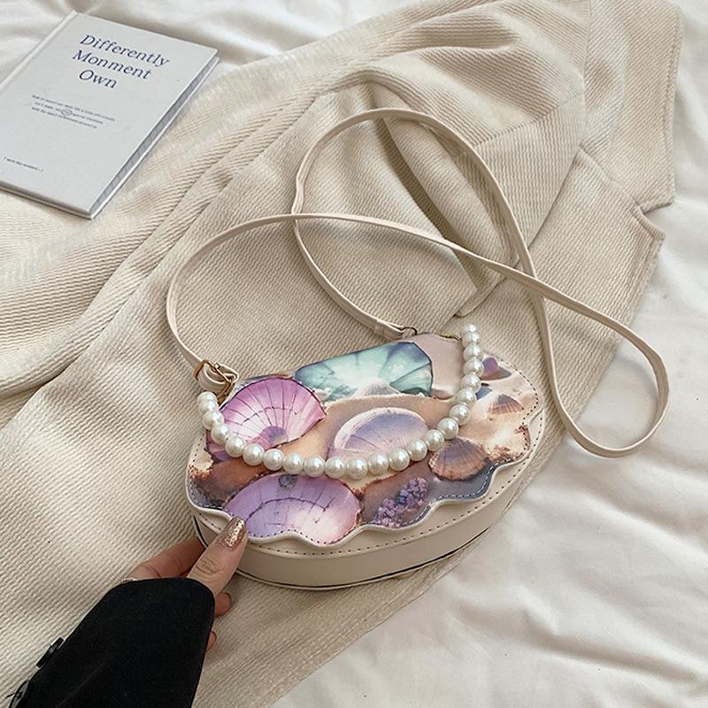 2024 summer new fashion trend messenger bag simple shell bag casual simple fashion retro shoulder bag бежевий
2024 summer new fashion trend messenger bag simple shell bag casual simple fashion retro shoulder bag бежевий