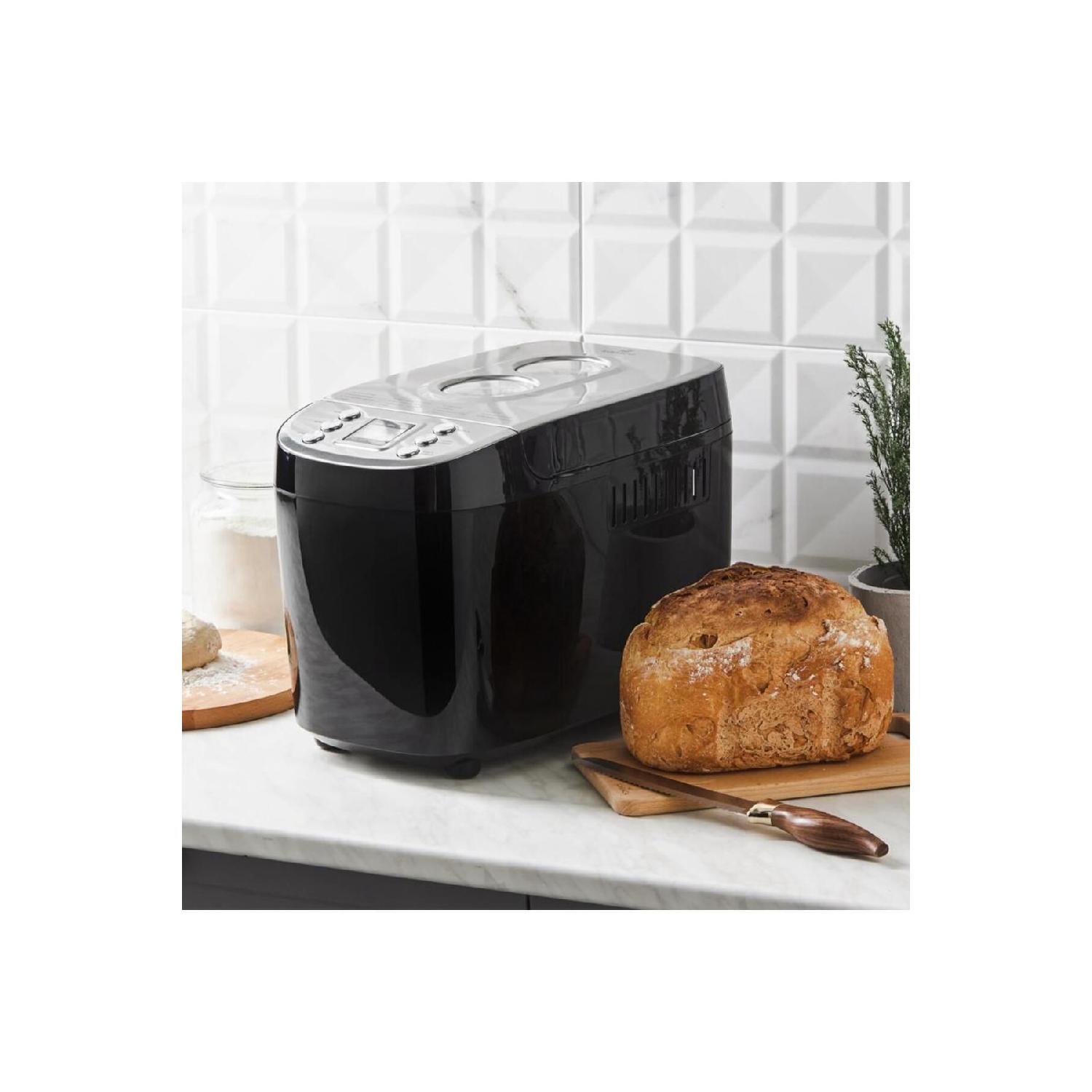 15 программ, вместимость 1500 г, машина для замешивания и изготовления хлеба премиум-класса, 45 различных буклетов с рецептами чёрный