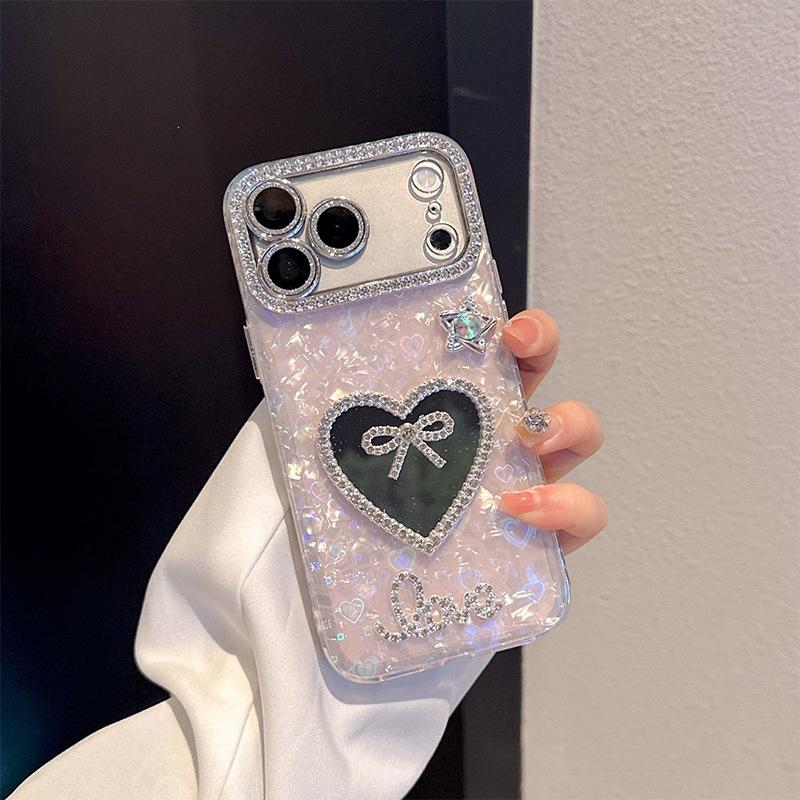 Bow tie rhinestone heart mirror mobile phone case for Iphone17 colorful shell pattern Apple 16 pearl hand chain iPhone 17Promax
Bow tie rhinestone heart mirror mobile phone case for Iphone17 colorful shell pattern Apple 16 pearl hand chain iPhone 17Promax