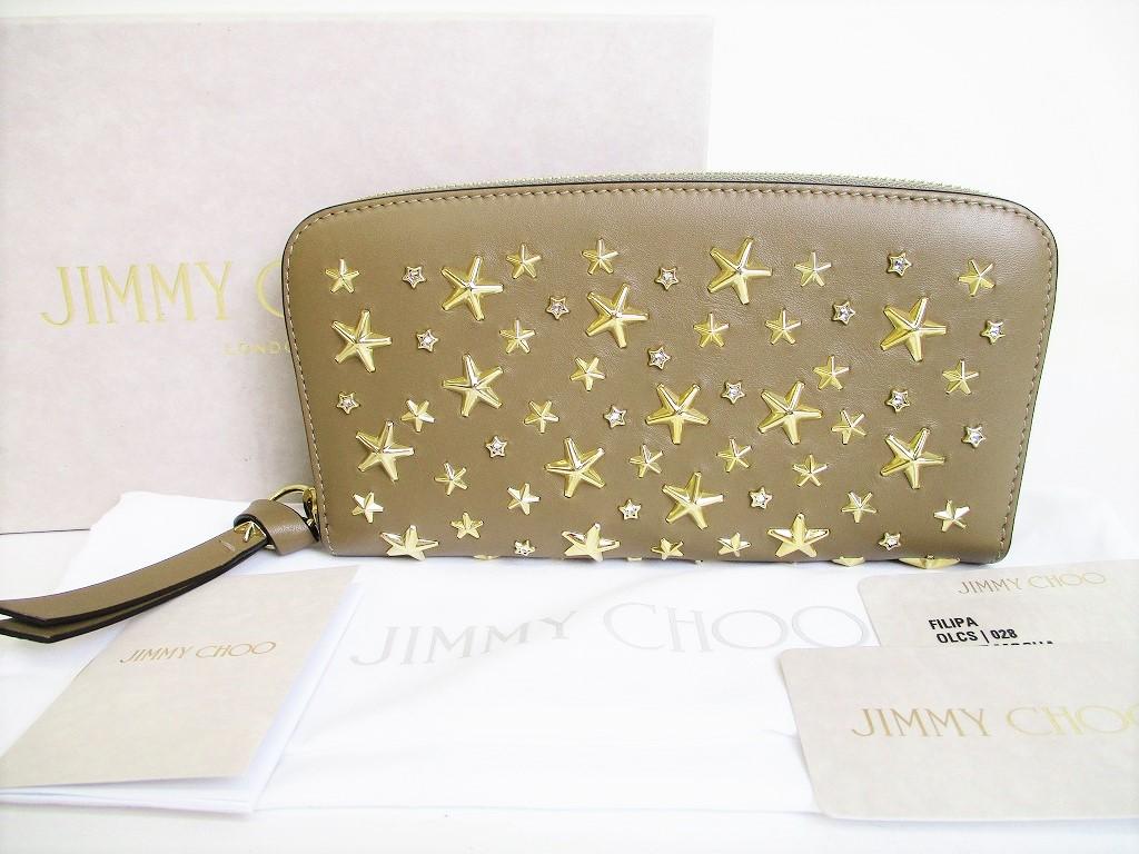 Автентичний круглий гаманець Jimmy Choo із золотими металевими зірками зі шкіри мокко №8365 відремонтований
Автентичний круглий гаманець Jimmy Choo із золотими металевими зірками зі шкіри мокко №8365 відремонтований