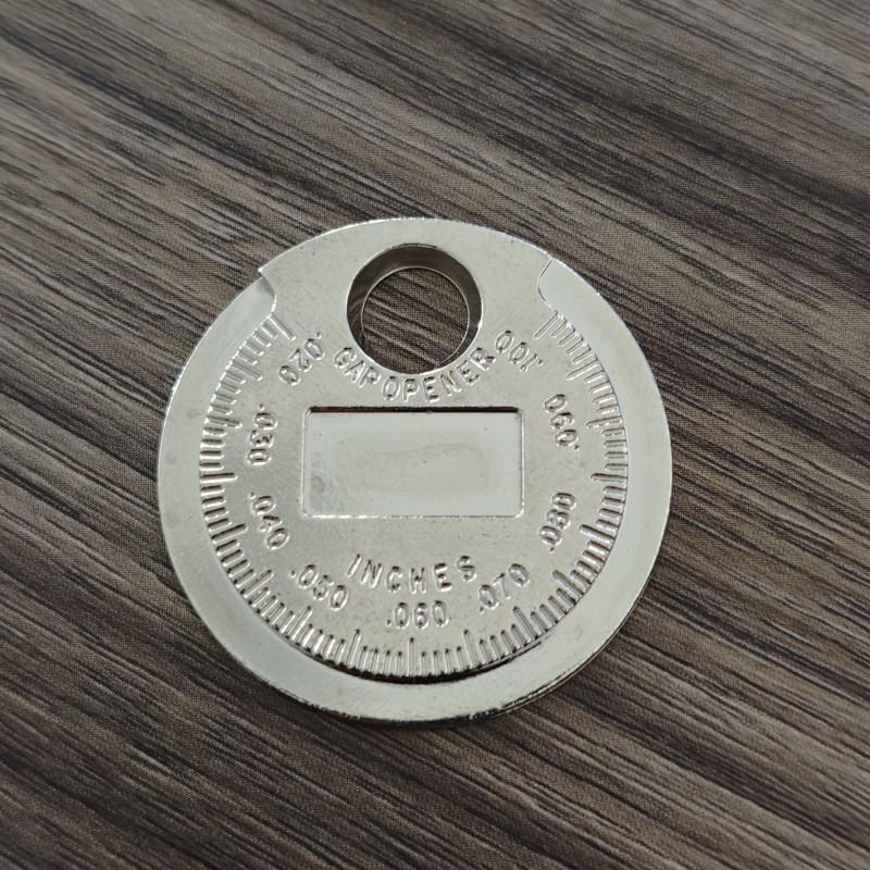 Coin-Shaped Spark Plug Gap Gauge 0.6-2.4mm Auto Repair Tool
Coin-Shaped Spark Plug Gap Gauge 0.6-2.4mm Auto Repair Tool
