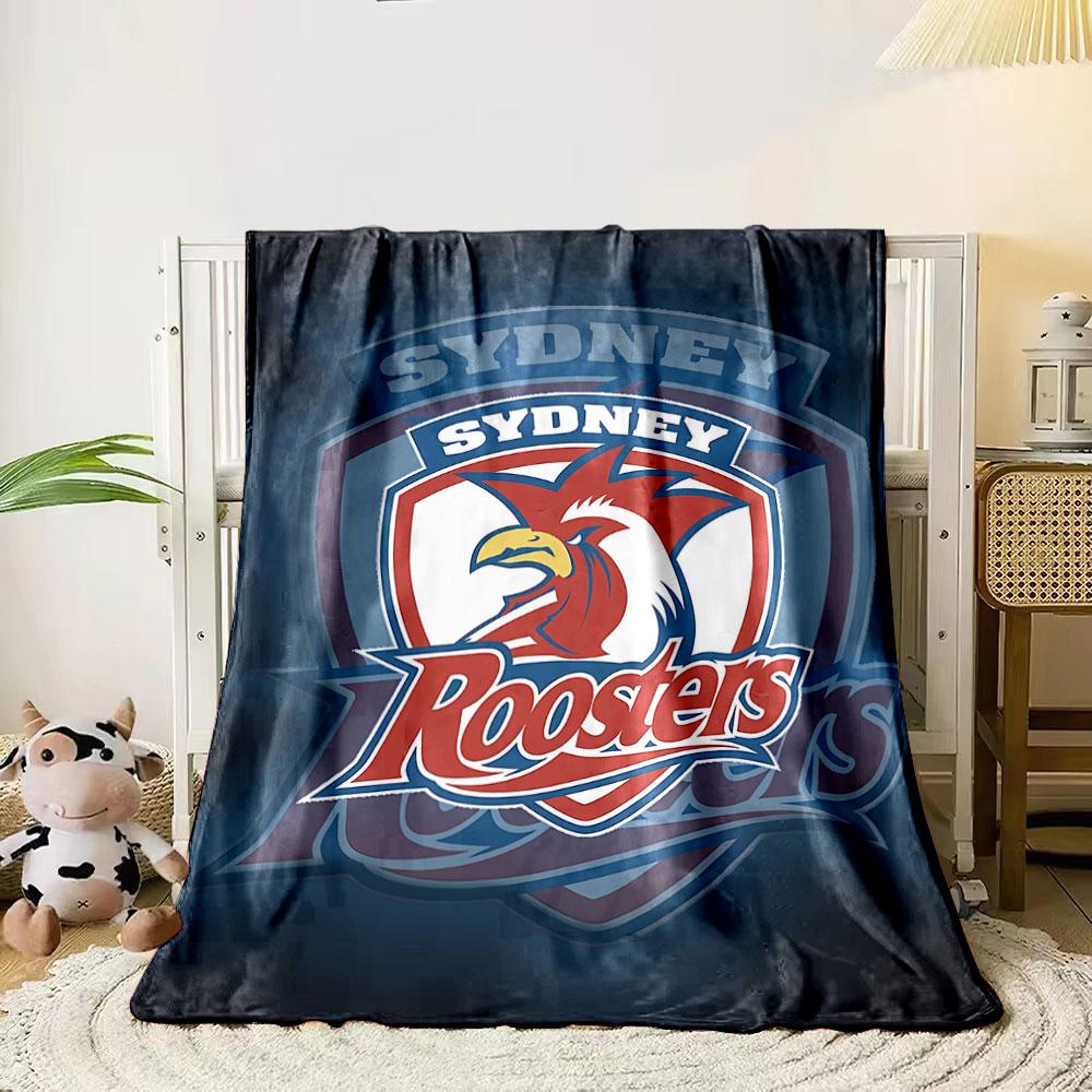 A stylized rooster within a shield featuring the words Sydney Roosters. for all seasons blanket lunch break throw gift 80cm x 120cm
A stylized rooster within a shield featuring the words Sydney Roosters. for all seasons blanket lunch break throw gift 80cm x 120cm