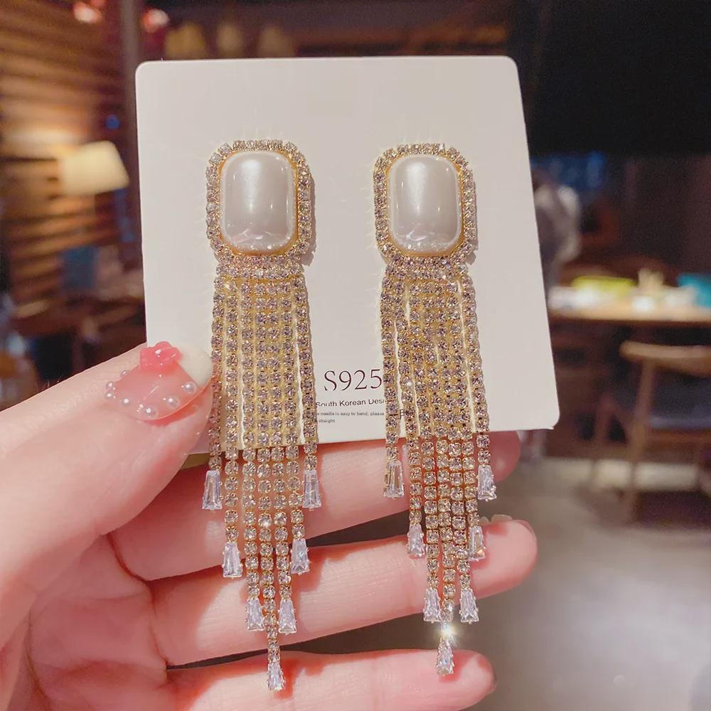 S925 Silver Needle Diamond Pearl Tassel Earrings - Korean Style, Versatile, Elegant, Long Fashion Jewelry for Women 9704 Printed Earrings
S925 Silver Needle Diamond Pearl Tassel Earrings - Korean Style, Versatile, Elegant, Long Fashion Jewelry for Women 9704 Printed Earrings