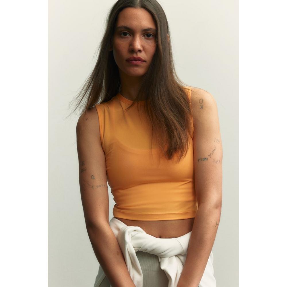 Укороченный спортивный топ HM DryMove оранжевый
Укороченный спортивный топ HM DryMove оранжевый