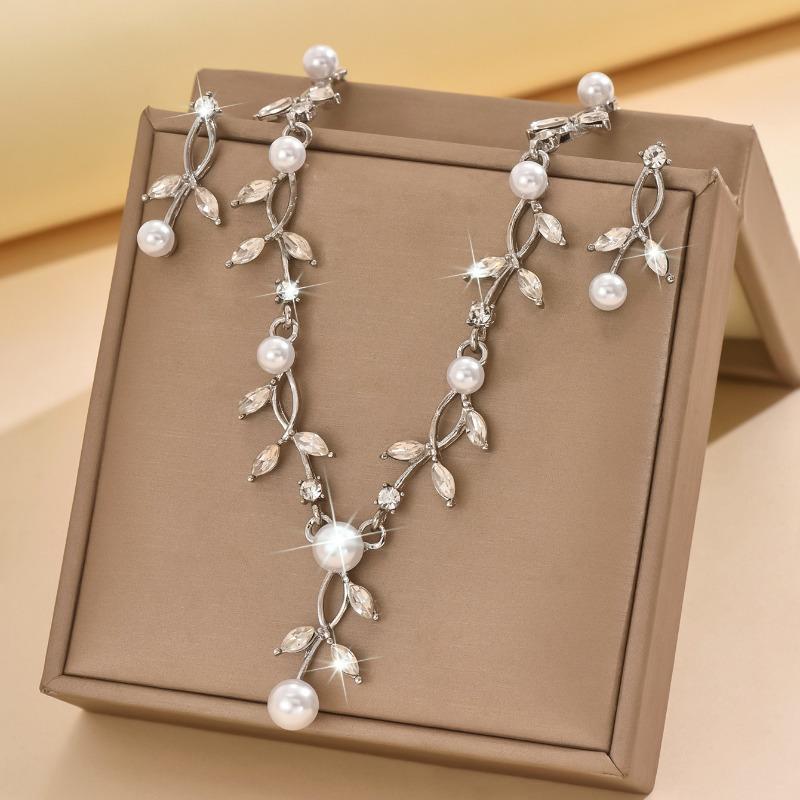 Set of falling leaves pearl necklace earrings fashionsuit dress accessories
Set of falling leaves pearl necklace earrings fashionsuit dress accessories