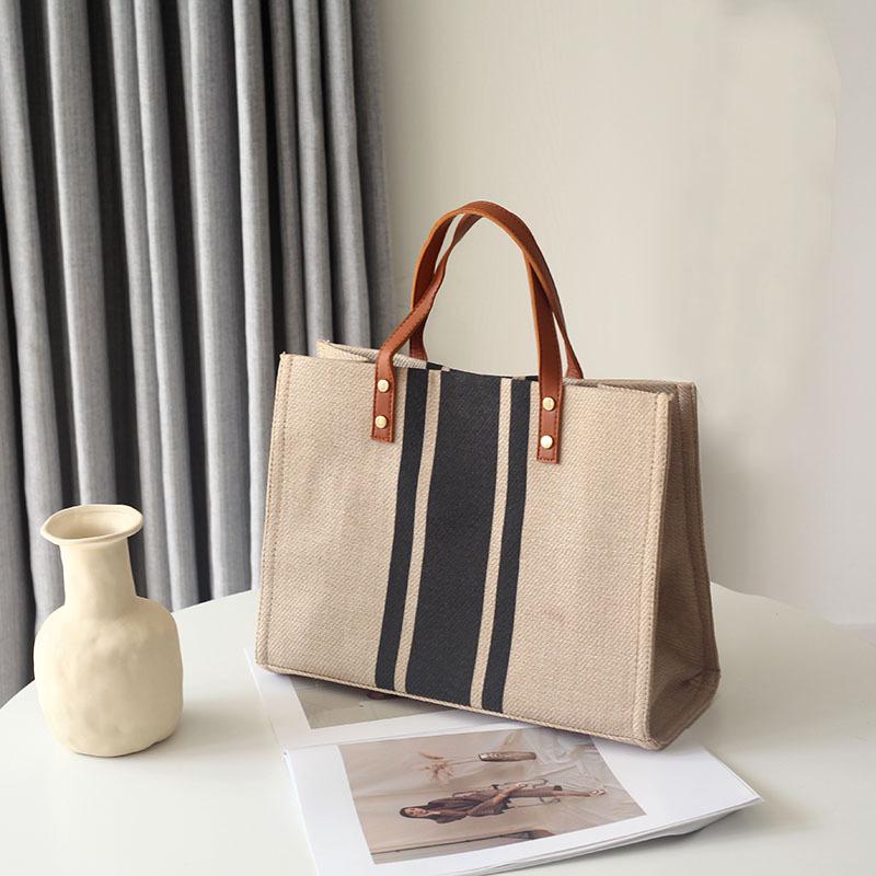 Shiling Niche Bag Female Commuter Student Hand-Held Canvas Bag Tote Bag Large-Capacity Briefcase
Shiling Niche Bag Female Commuter Student Hand-Held Canvas Bag Tote Bag Large-Capacity Briefcase