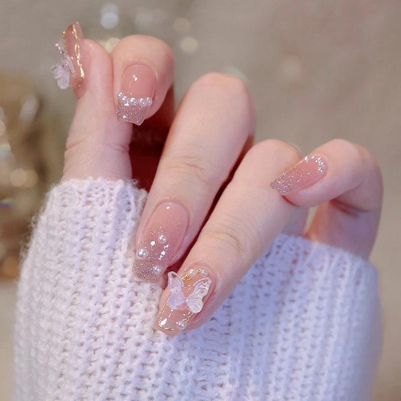 Handmade Butterfly Glitter Nail Stickers with Beaded Chain and Gilded Ice Translucent Tips
Handmade Butterfly Glitter Nail Stickers with Beaded Chain and Gilded Ice Translucent Tips