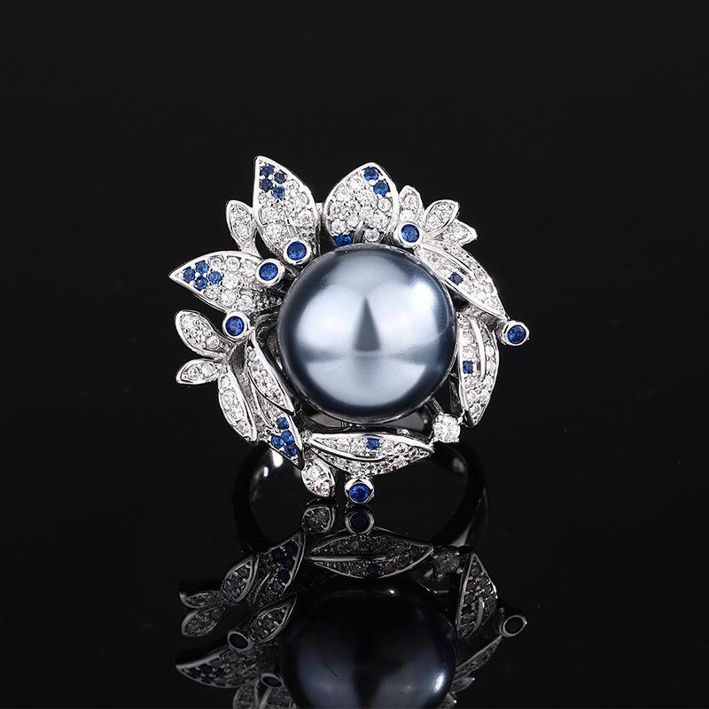 Ювелирные изделия Медь Платиновое покрытие Жемчуг Цветок Темперамент Легкая роскошь Кольцо 14мм
Ювелирные изделия Медь Платиновое покрытие Жемчуг Цветок Темперамент Легкая роскошь Кольцо 14мм