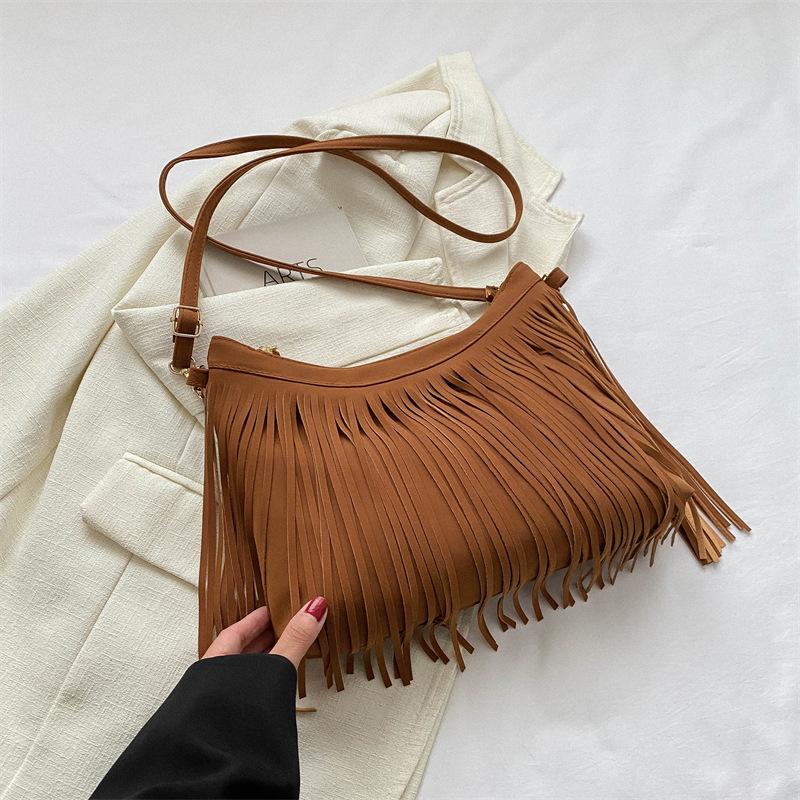 Кисточка большая вместимость модная женская сумка через плечо и мессенджер женская 2025 осень и зима новая женская сумка коричневый
Кисточка большая вместимость модная женская сумка через плечо и мессенджер женская 2025 осень и зима новая женская сумка коричневый