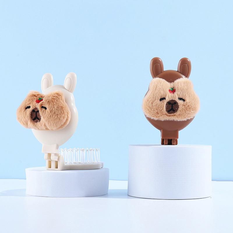 Kapibala Plush Folding Mirror Comb Cartoon Hollow Air Cushion Comb Salon Hairdressing Massage Hair Brush Portable Makeup Tool
Kapibala Plush Folding Mirror Comb Cartoon Hollow Air Cushion Comb Salon Hairdressing Massage Hair Brush Portable Makeup Tool