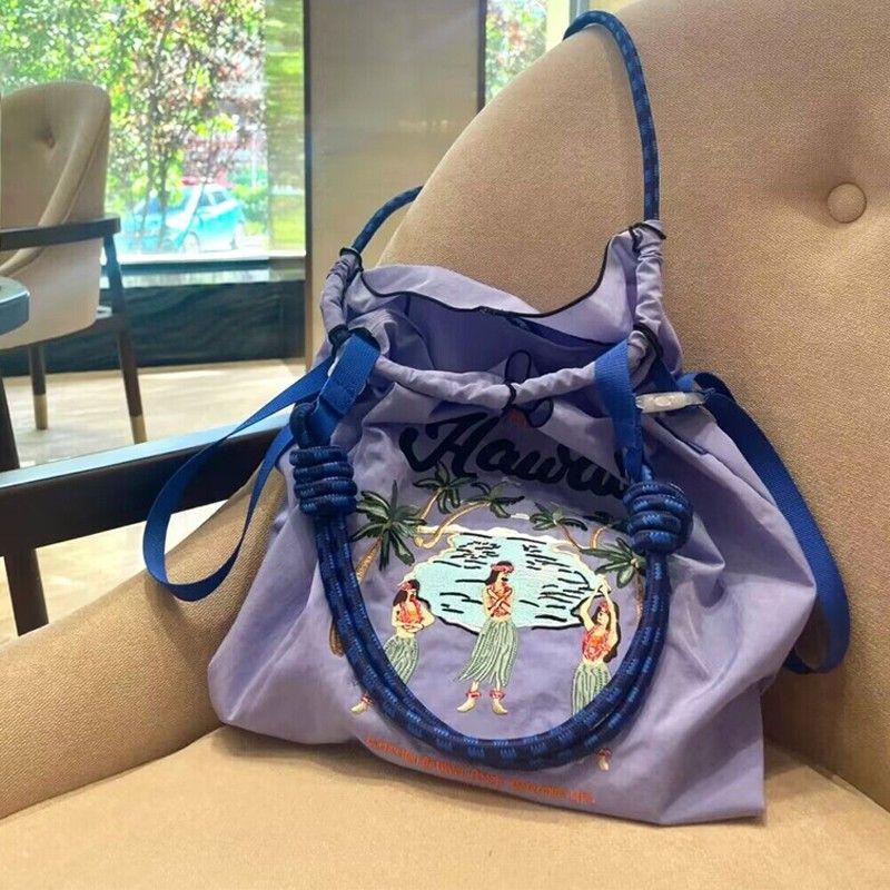 Niche Eco-Friendly Embroidered Nylon Shopping Tote - Handheld/Shoulder/Crossbody Bag with Artisanal Flair M
Niche Eco-Friendly Embroidered Nylon Shopping Tote - Handheld/Shoulder/Crossbody Bag with Artisanal Flair M