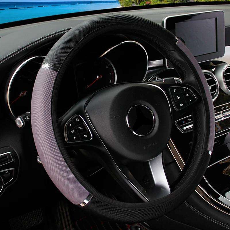 Чехол на руль автомобиля Универсальный кожаный противоскользящий защитный чехол Аксессуары для интерьера автомобиля 38 см серый
Чехол на руль автомобиля Универсальный кожаный противоскользящий защитный чехол Аксессуары для интерьера автомобиля 38 см серый