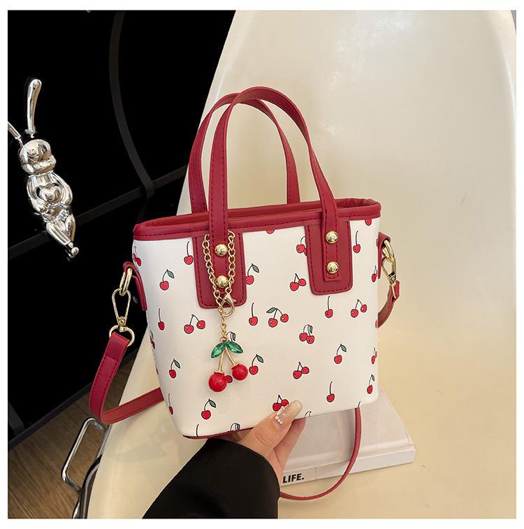 2025 new cherry portable fashion bag handbag large capacity cute commuter shoulder tote bucket
2025 new cherry portable fashion bag handbag large capacity cute commuter shoulder tote bucket