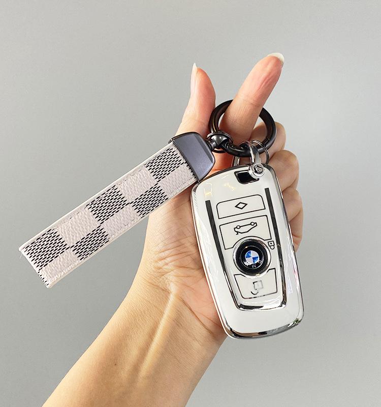 TPU Сріблястий Крайний Чохол для Ключа BMW для X3, X5, X6, Нових 5, 7 та 3 Серій - Чорно-Білий Корпус Ключа з Пряжкою.
TPU Сріблястий Крайний Чохол для Ключа BMW для X3, X5, X6, Нових 5, 7 та 3 Серій - Чорно-Білий Корпус Ключа з Пряжкою.
