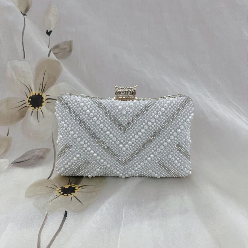 Simple chain small square bag evening women s bag shoulder messenger banquet clutch bag new pearl diamond dinner bag білий
Simple chain small square bag evening women s bag shoulder messenger banquet clutch bag new pearl diamond dinner bag білий