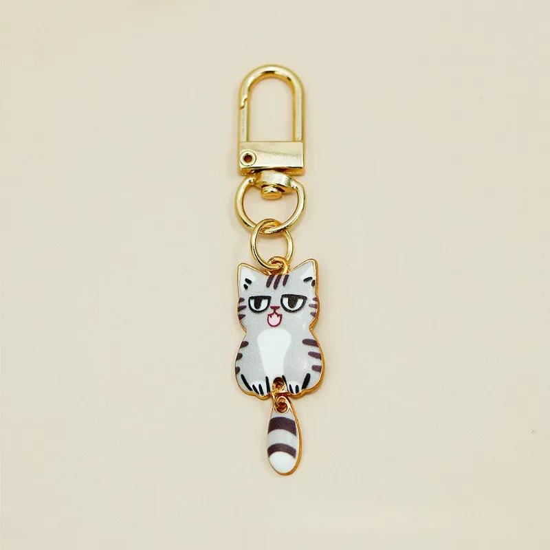 Cute Cat Keychain Cartoon Wagging Tail Cats Key Ring Metal Animal Pendant for Earphone Case Bag Accessories Pet Lover Gifts
Cute Cat Keychain Cartoon Wagging Tail Cats Key Ring Metal Animal Pendant for Earphone Case Bag Accessories Pet Lover Gifts