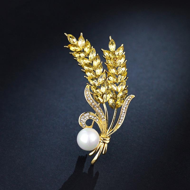 Gold Wheat Ear Brooch: Rhinestone Pin for Women’s Autumn/Winter Suit or Corsage, Simple and Elegant Barley Design.
Gold Wheat Ear Brooch: Rhinestone Pin for Women’s Autumn/Winter Suit or Corsage, Simple and Elegant Barley Design.