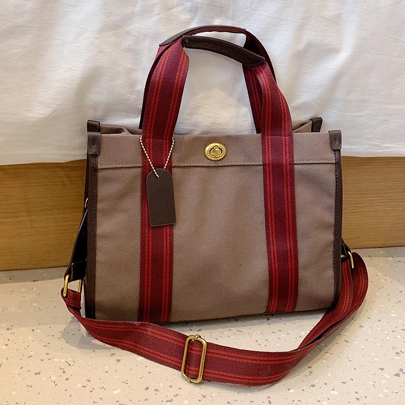 Canvas Bag Summer Fashionable and Versatile Women s Bag Premium Handheld Large Capacity Tote Bag
Canvas Bag Summer Fashionable and Versatile Women s Bag Premium Handheld Large Capacity Tote Bag