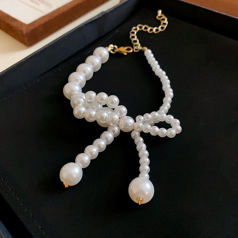 Французький квадратний цирконієвий перловий браслет жіночий простий та елегантний темпераментний браслет модна ретро високоякісна біжутерія
Французький квадратний цирконієвий перловий браслет жіночий простий та елегантний темпераментний браслет модна ретро високоякісна біжутерія