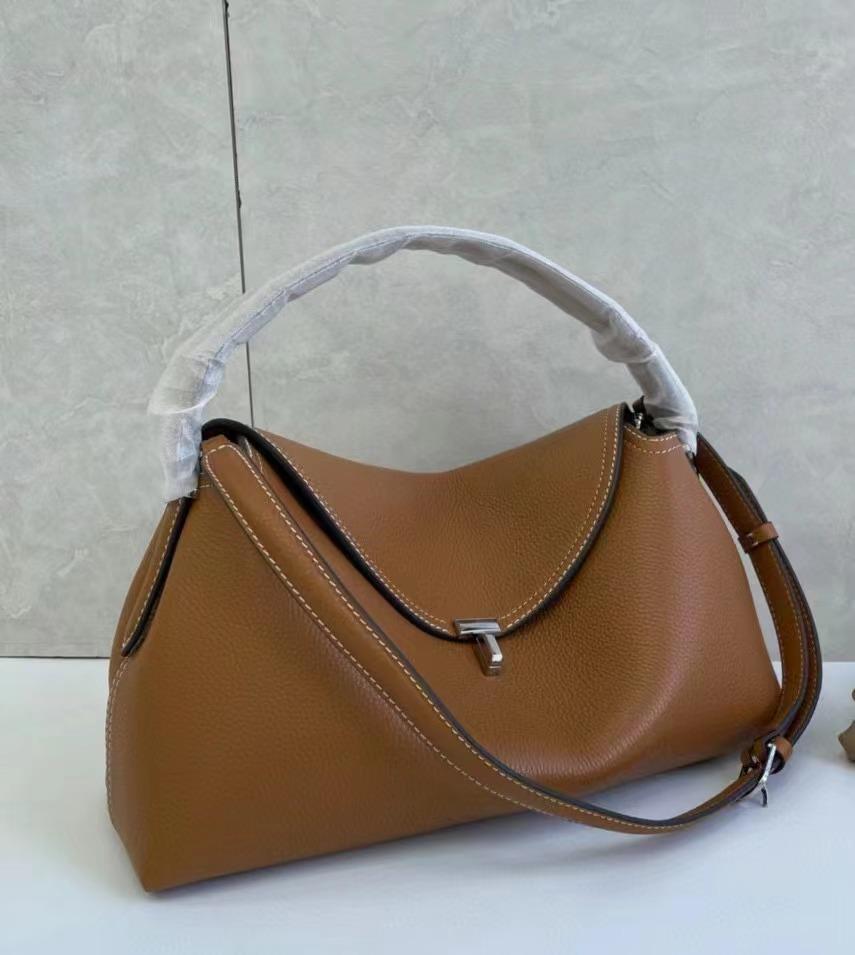 Sweden Savi Commuter Crossbody Bag: Top Layer Cowhide, Large Capacity, Shoulder Tote, Underarm Essential Small 26cm*9cm*15cm
Sweden Savi Commuter Crossbody Bag: Top Layer Cowhide, Large Capacity, Shoulder Tote, Underarm Essential Small 26cm*9cm*15cm
