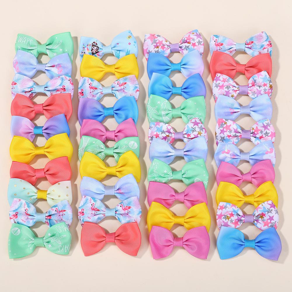 40Pcs random bowknot hairclips girls colorful mini hair bangs side clip cartoon baby kids party travel boutique headwear
40Pcs random bowknot hairclips girls colorful mini hair bangs side clip cartoon baby kids party travel boutique headwear