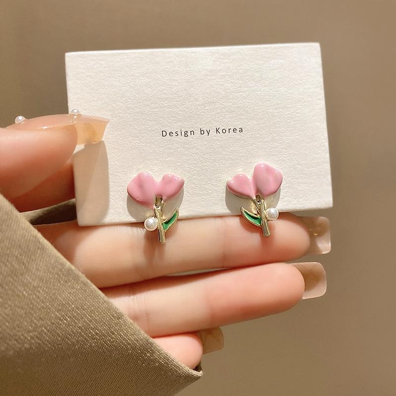 Silver needle simple small fresh pink tulip flower earrings ins tide forest pearl stud earrings
Silver needle simple small fresh pink tulip flower earrings ins tide forest pearl stud earrings