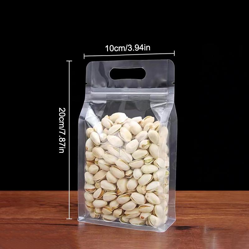 50Pcs Food Packaging Bags Transparent With Handle Stand Up Sealed For Candy Nuts Storage Reusable Zip Lock Pouches 1
50Pcs Food Packaging Bags Transparent With Handle Stand Up Sealed For Candy Nuts Storage Reusable Zip Lock Pouches 1