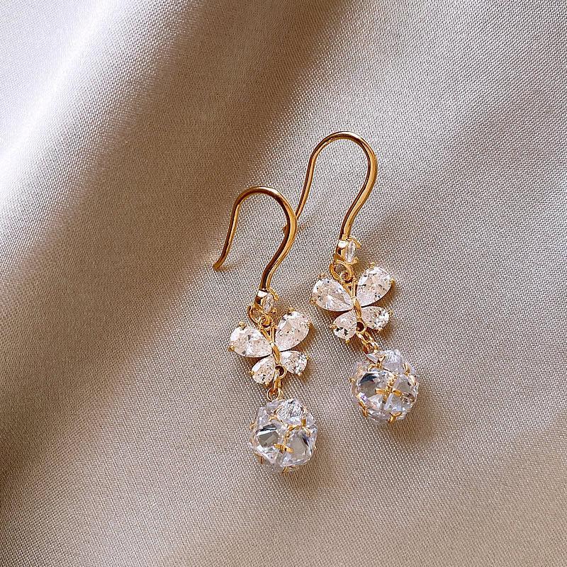 K real gold electroplated zircon butterfly pendant ear hook retro temperament versatile earrings light luxury high-end earrings women
K real gold electroplated zircon butterfly pendant ear hook retro temperament versatile earrings light luxury high-end earrings women