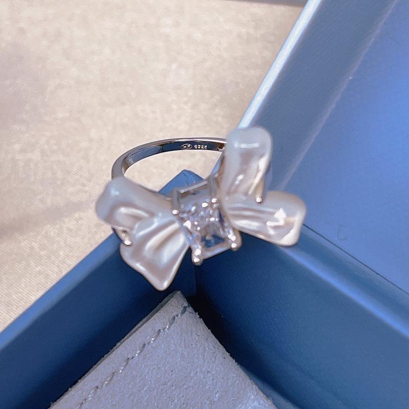 Hejia Mother-of-Pearl Bow Zircon Sterling Silver Ring Set - Women s Japanese & Korean Fashion, Elegant Closed Index Finger Design. Size 8 (56mm)
Hejia Mother-of-Pearl Bow Zircon Sterling Silver Ring Set - Women s Japanese & Korean Fashion, Elegant Closed Index Finger Design. Size 8 (56mm)