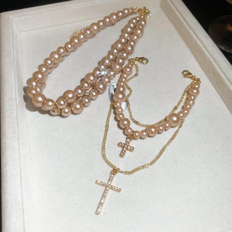 Diamond Cross Pendant Pearl Necklace Vintage Temperament Versatile Collarbone Chain Sweater Chain
Diamond Cross Pendant Pearl Necklace Vintage Temperament Versatile Collarbone Chain Sweater Chain