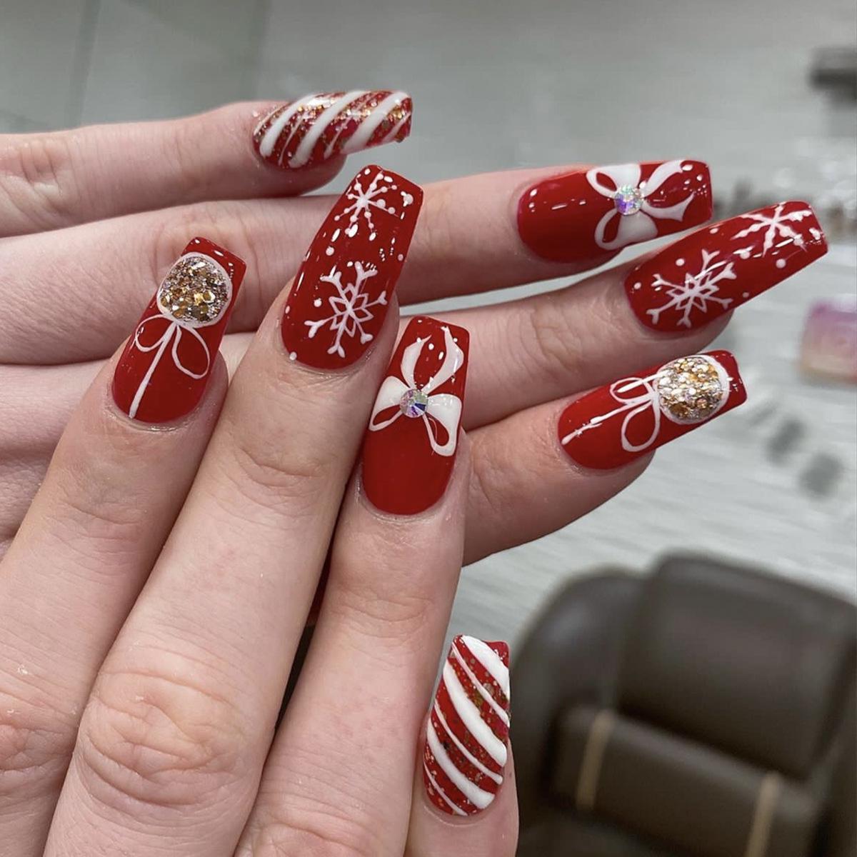 Festive Wearable Nail Patches: Snowflake Ballet White with Red & White Stripes, Bow, Rhinestone Accents
Festive Wearable Nail Patches: Snowflake Ballet White with Red & White Stripes, Bow, Rhinestone Accents