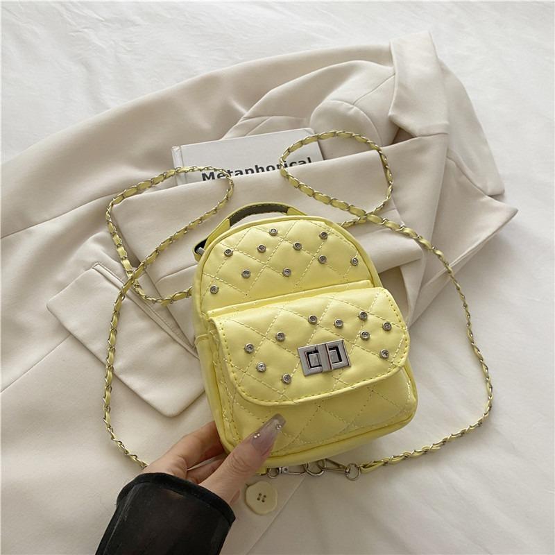 Diamond-encrusted backpack bag women s new trendy fashion versatile chain high-value small schoolbag жовтий
Diamond-encrusted backpack bag women s new trendy fashion versatile chain high-value small schoolbag жовтий
