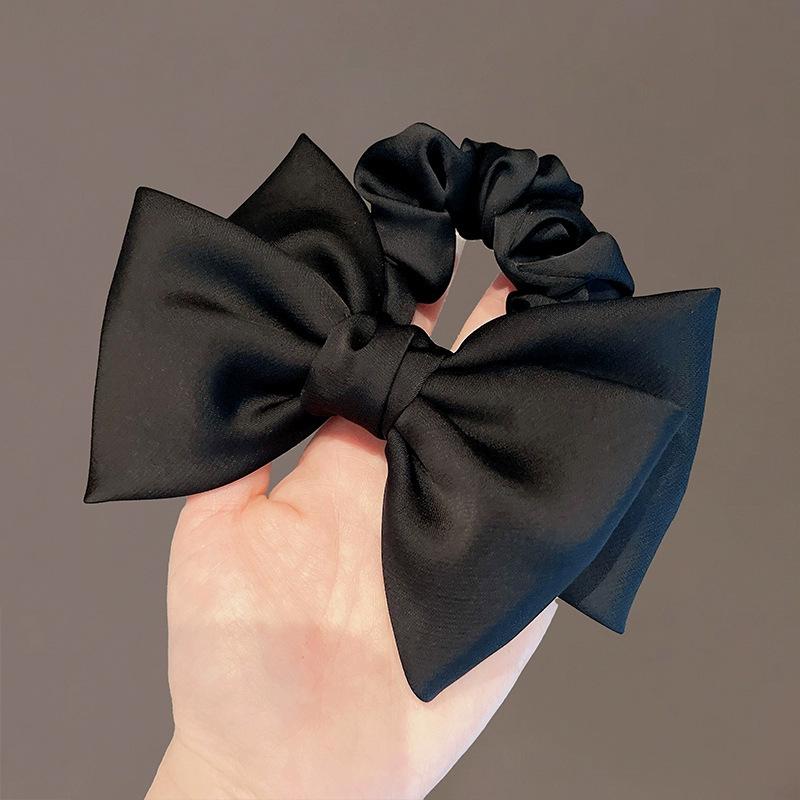 Black Bow Hair Tie: Elegant Ponytail Holder & Rubber Band for Women
Black Bow Hair Tie: Elegant Ponytail Holder & Rubber Band for Women