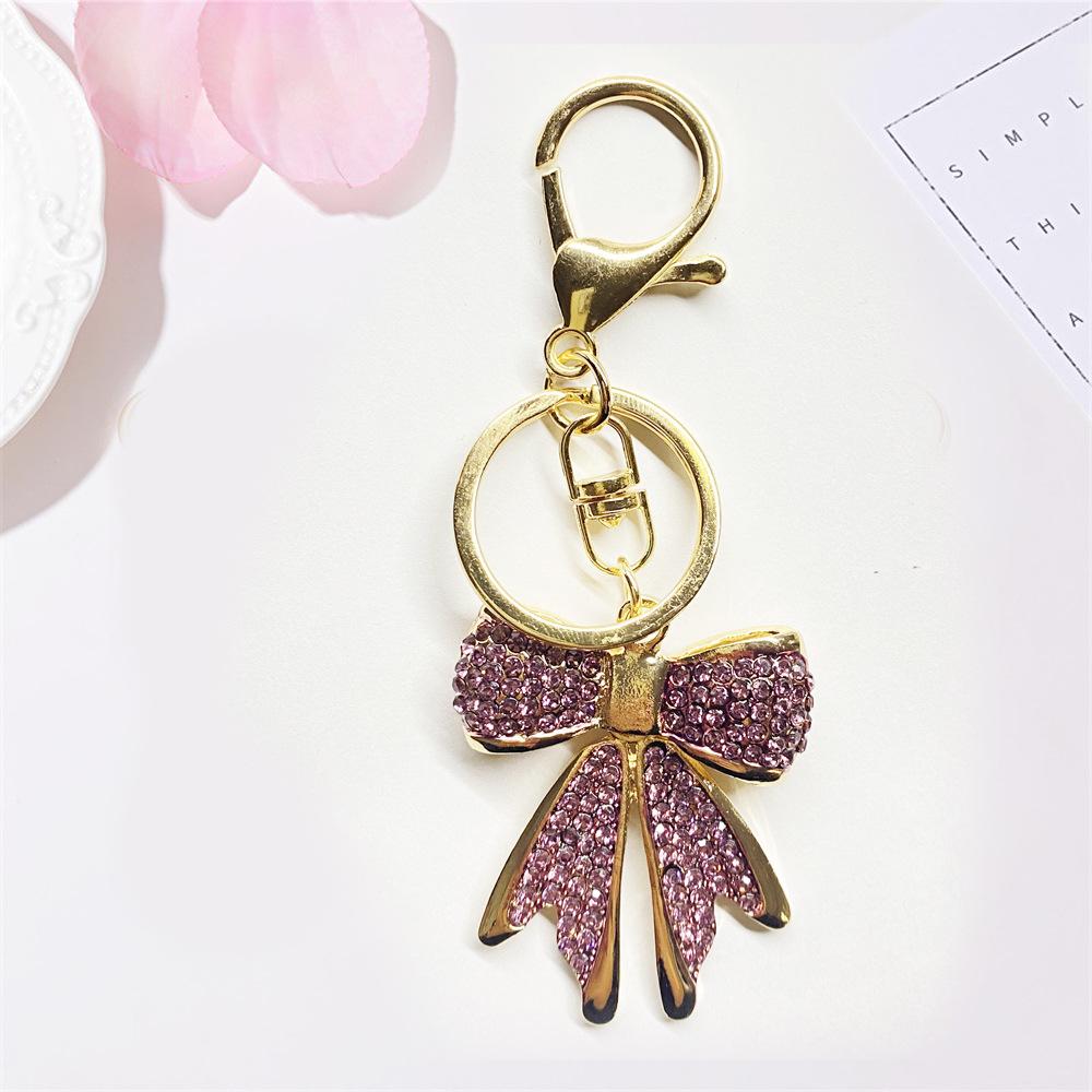A European and American full diamond bow clothing keychain key accessories - fashionable and cute. Women s bag accessories фіолетовий
A European and American full diamond bow clothing keychain key accessories - fashionable and cute. Women s bag accessories фіолетовий