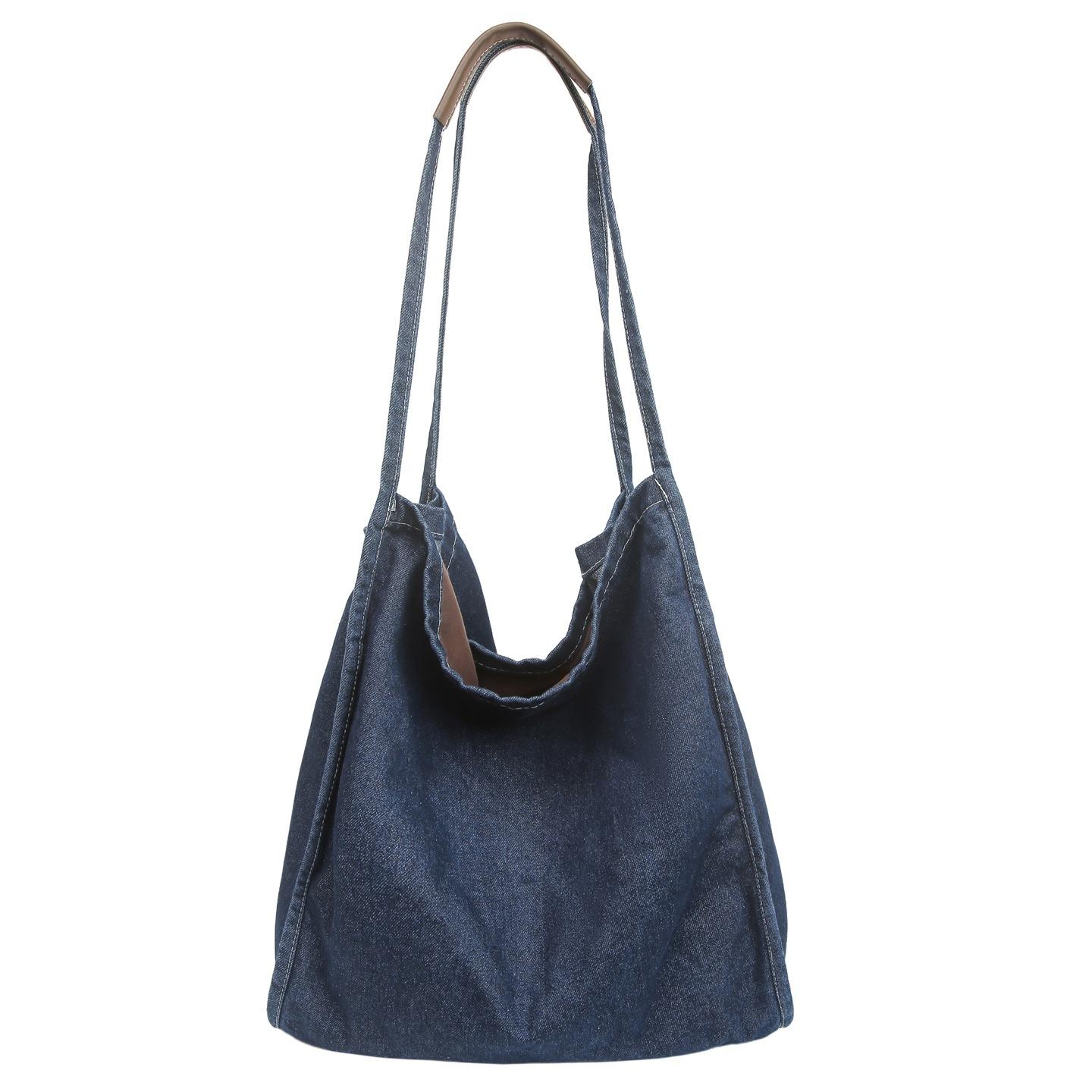Autumn and winter retro versatile shoulder backpack female student casual canvas large capacity handbag messenger bag темно-синього кольору
Autumn and winter retro versatile shoulder backpack female student casual canvas large capacity handbag messenger bag темно-синього кольору