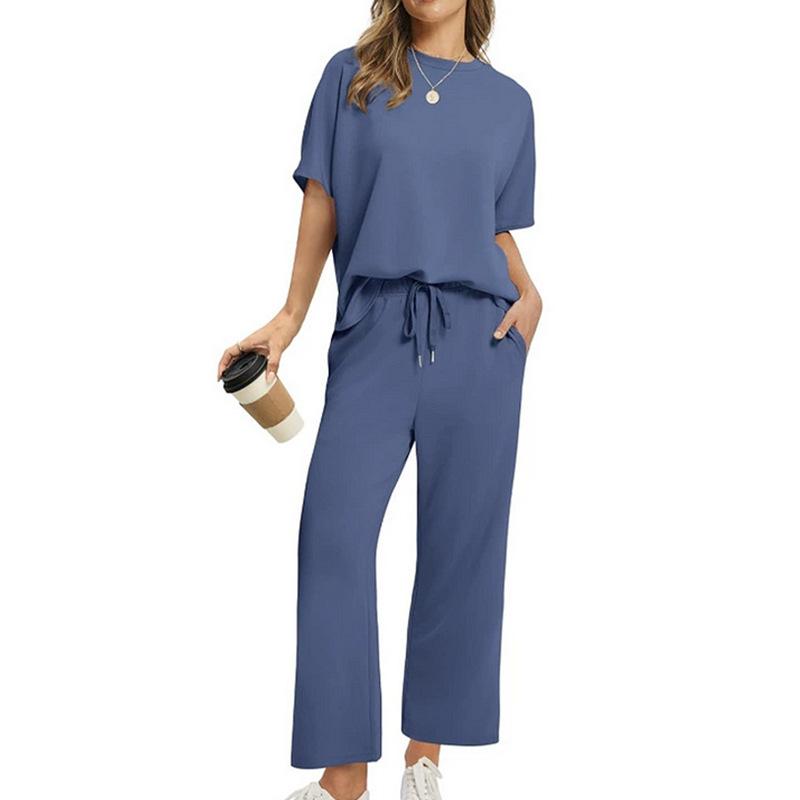 Жіночий повсякденний комплект з топу з коротким рукавом та штанів широкого крою бежевого, рожевого, чорного, синього кольорів 4XL море синього кольору
Жіночий повсякденний комплект з топу з коротким рукавом та штанів широкого крою бежевого, рожевого, чорного, синього кольорів 4XL море синього кольору