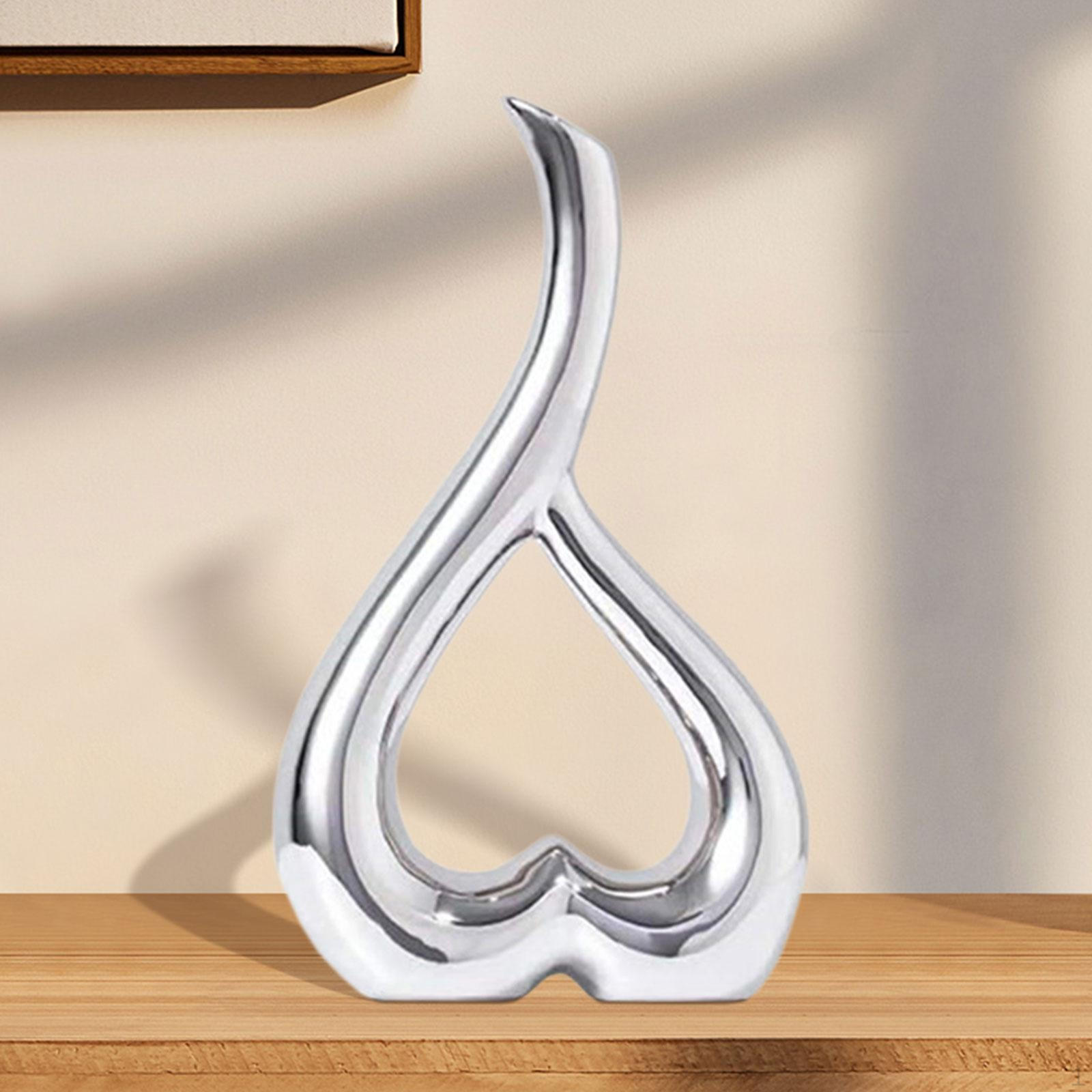 Contemporary Heart Vase Sculpture for Home Decor срібний
Contemporary Heart Vase Sculpture for Home Decor срібний