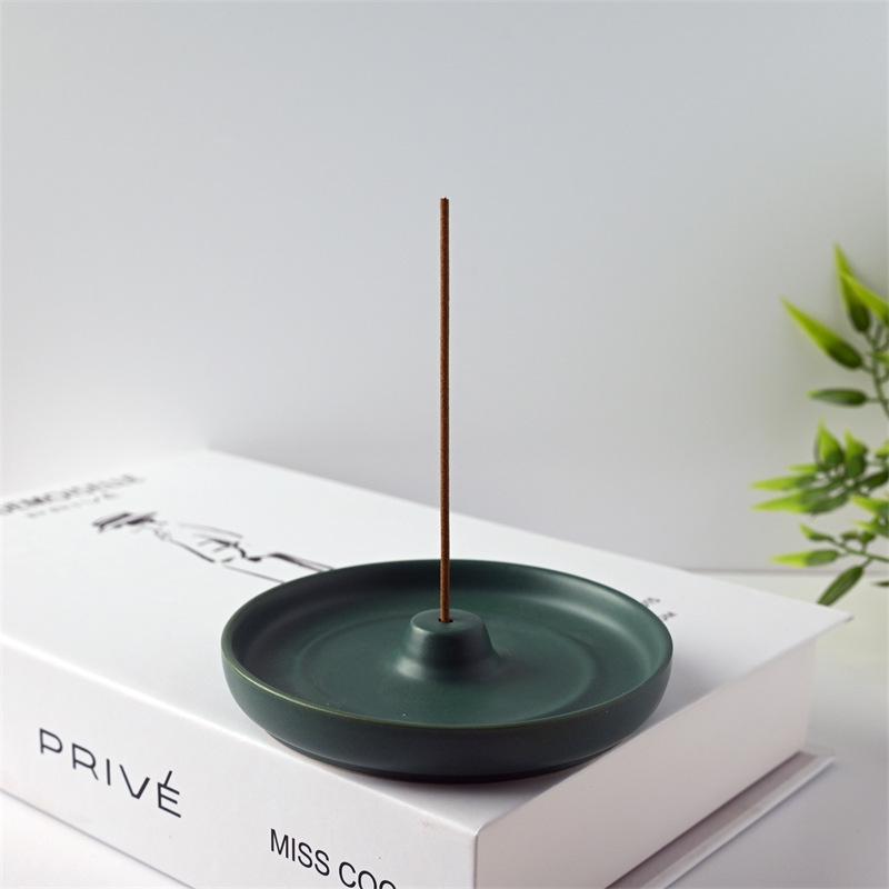Elegant Ceramic Incense Stick Holder: Chinese White Round Plate Ornament
Elegant Ceramic Incense Stick Holder: Chinese White Round Plate Ornament