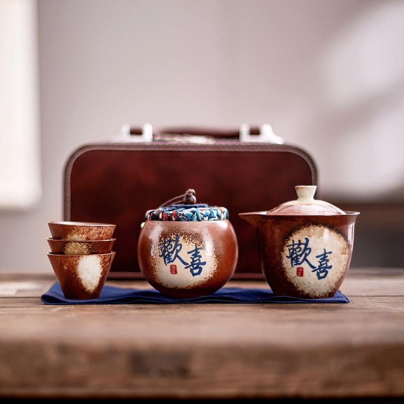 Imitation firewood burning car tea set, retro ceramic one pot, three cups with tea can storage, leather bag set
Imitation firewood burning car tea set, retro ceramic one pot, three cups with tea can storage, leather bag set