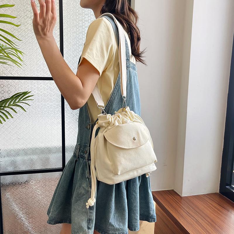 Canvas bag women s spring and summer niche drawstring one-shoulder crossbody bag pleated bucket bag
Canvas bag women s spring and summer niche drawstring one-shoulder crossbody bag pleated bucket bag