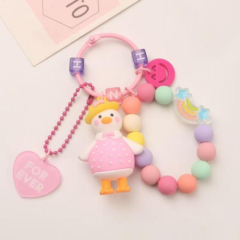 Colorful Silicone Duck Keychain with Beads and Heart Charm розовый
Colorful Silicone Duck Keychain with Beads and Heart Charm розовый