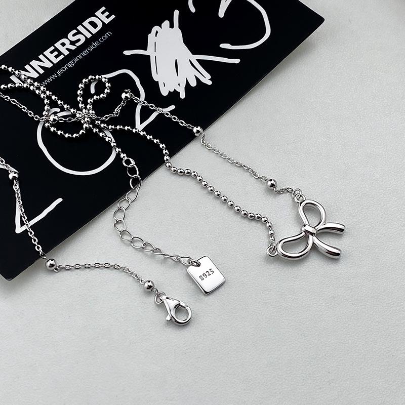 Милое асимметричное ожерелье с бантом, новый стиль
Милое асимметричное ожерелье с бантом, новый стиль