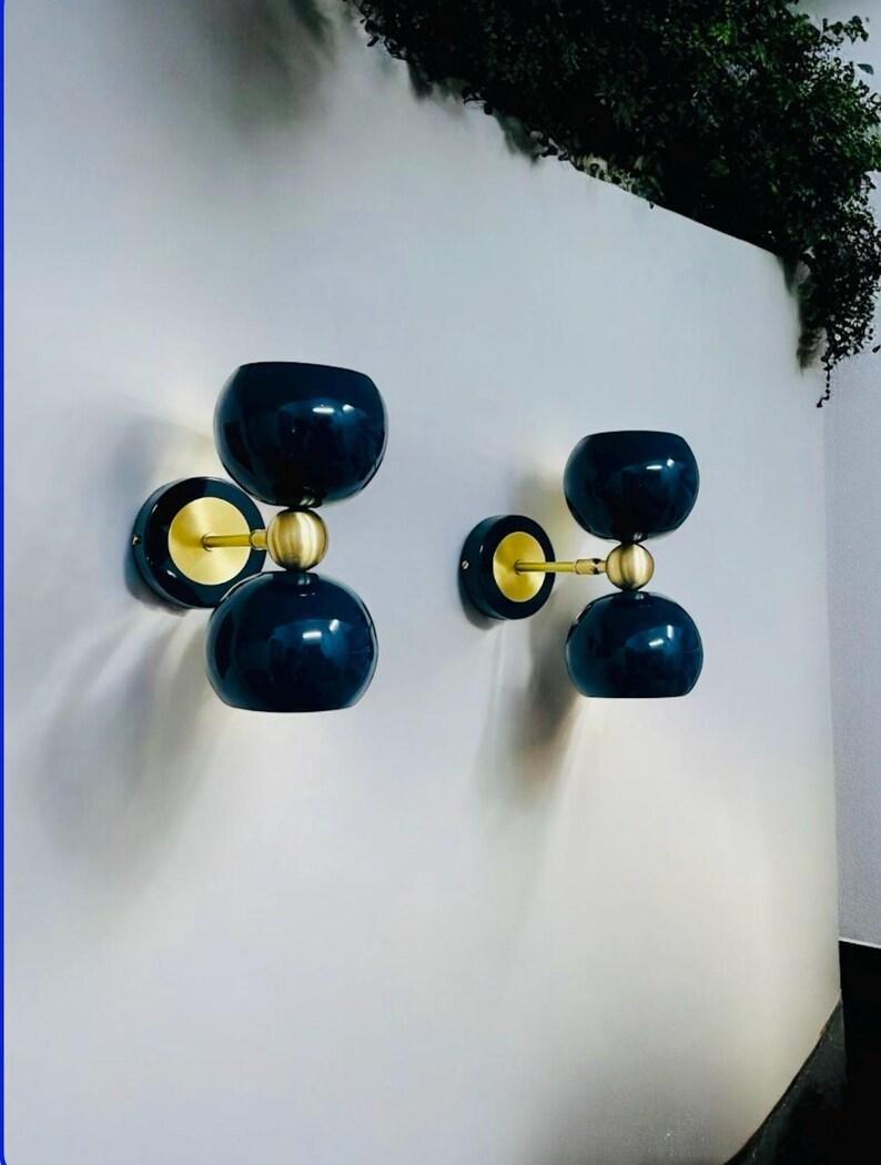 Brass Diabolo Wall Sconces – Mid-Century Style Vanity Light Set | Custom Mid-Century Modern Wall Fixtures Pair Sconces синій
Brass Diabolo Wall Sconces – Mid-Century Style Vanity Light Set | Custom Mid-Century Modern Wall Fixtures Pair Sconces синій