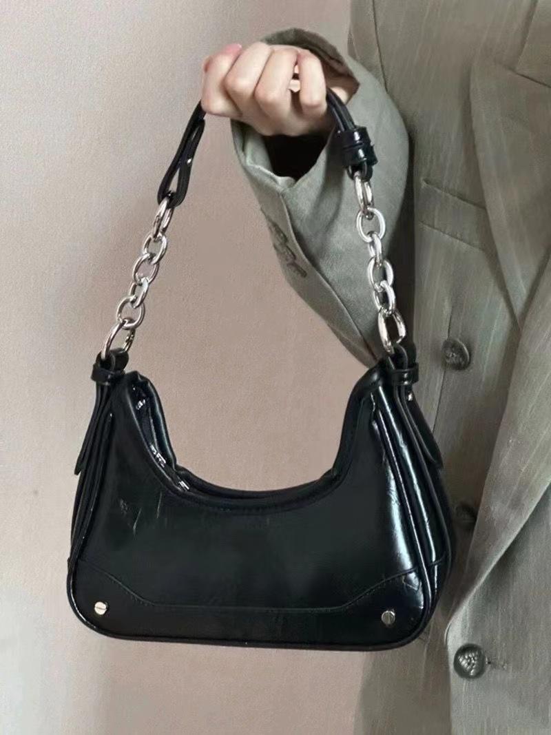 Silver women s bag, new niche portable chain baguette underarm bag, high-end versatile shoulder messenger bag. чорний
Silver women s bag, new niche portable chain baguette underarm bag, high-end versatile shoulder messenger bag. чорний