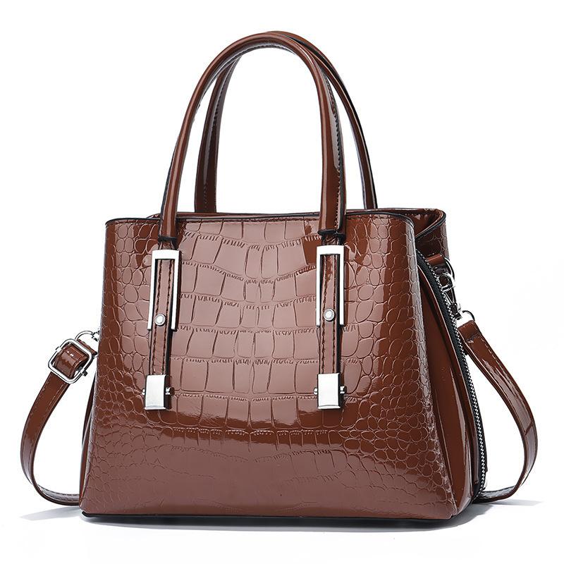 Fashionable bright leather handbag for women, European and American stone-patterned women s foreign trade bags коричневий
Fashionable bright leather handbag for women, European and American stone-patterned women s foreign trade bags коричневий
