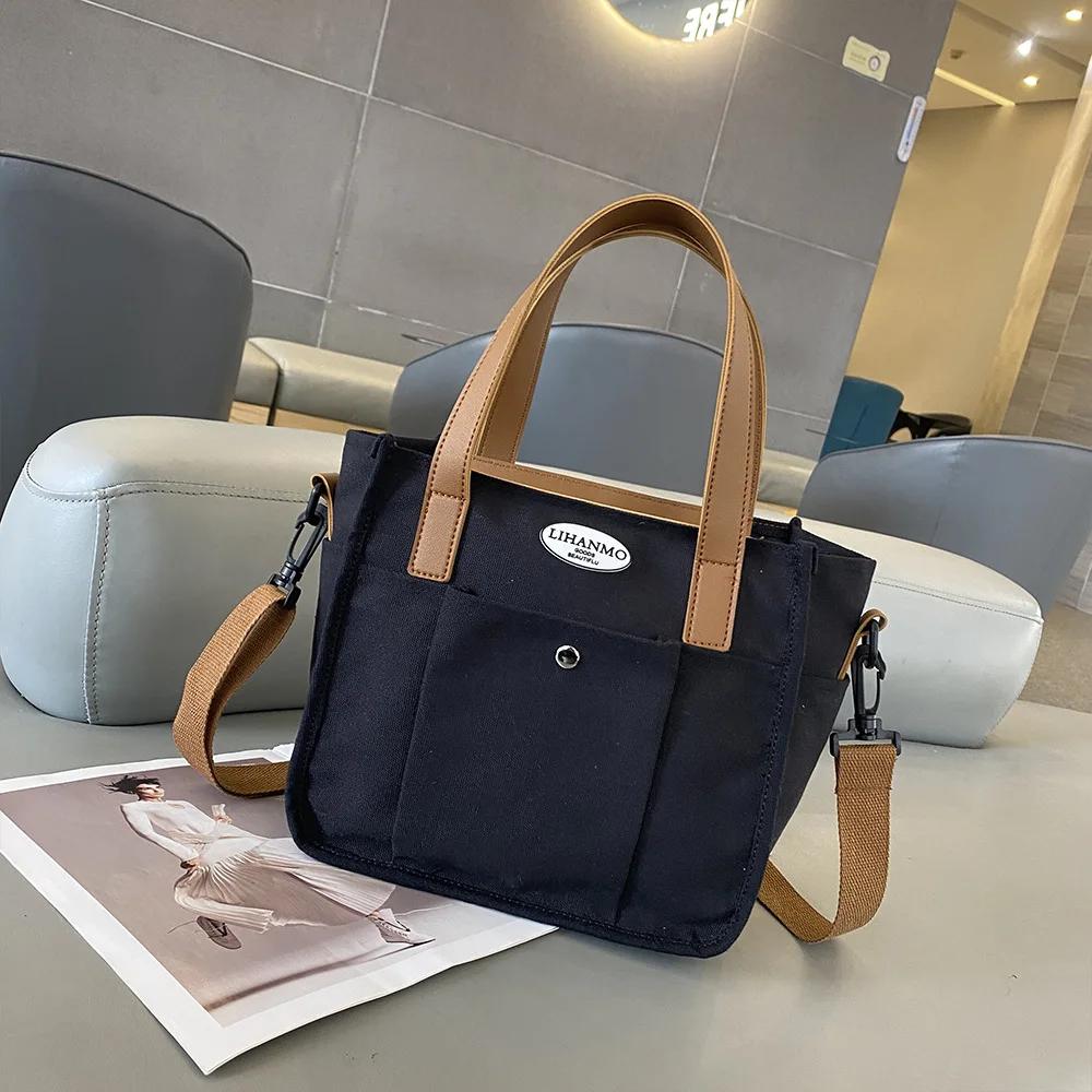 Новая сумка на одно плечо для девочек, модная и повседневная, большая вместительная сумка-тоут, сумка через плечо, академический стиль
Новая сумка на одно плечо для девочек, модная и повседневная, большая вместительная сумка-тоут, сумка через плечо, академический стиль