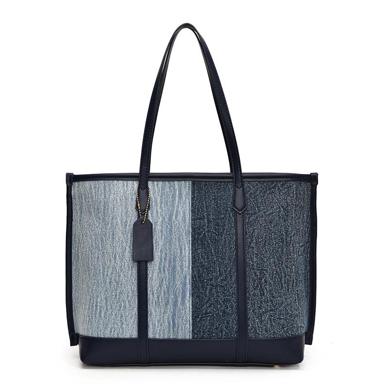 Autumn and winter new simple denim tote bag shoulder bag women s commuting bag large-capacity splicing contrasting color bag
Autumn and winter new simple denim tote bag shoulder bag women s commuting bag large-capacity splicing contrasting color bag