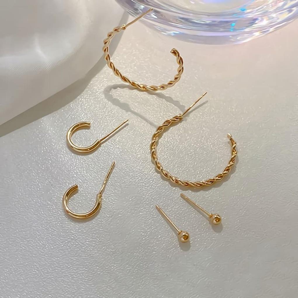 Women s Simple Gold Ring, Cubic Zirconia Ring, and Earring Set
Women s Simple Gold Ring, Cubic Zirconia Ring, and Earring Set